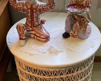 Japanese Statues on top of the Basket table within a table