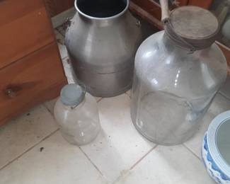 Large antique jars with lids.