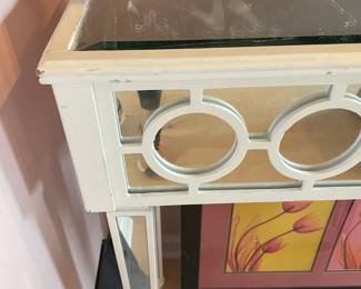 	#18	Silver Mirror w/circular panel console table	49x14x35		40.00																							