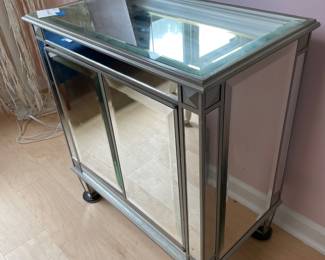 	#15	Mirrored Silver Storage Cabinet/Chest. 2 doors 	28x16x30		40.00																							