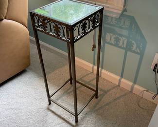 	#70	Metal and glass plant stand	10.5x27		20.00																							