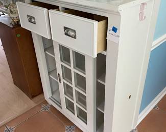 	#6	White Storage Cabinet w/2 drawers and 2 sliding doors.	36.5x17x47.5		100.00																							