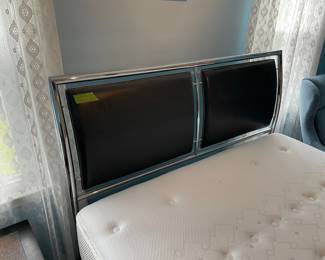 	#62	Chrome and "leather" queen bed frame, headboard, frame and footboard	60x80		60.00																							