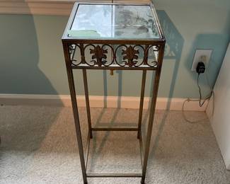 	#70	Metal and glass plant stand	10.5x27		20.00																							