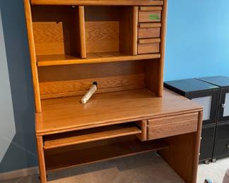 	#64	Oak Desk w storage cubbies, 4 drawers and keyboard drawer	48x25x66		30.00																							