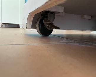 	#7	White Kitchen Cart on wheels. w/2 drawers, 2 doors, spice cabinet. Marble cutting board	41.5x21x36		125.00																							