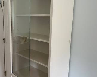 	#35	Wood Cabinet - Glass sliding doors	26.5x14x73		15.00																							