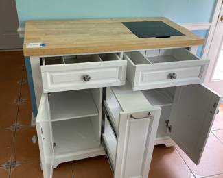 	#7	White Kitchen Cart on wheels. w/2 drawers, 2 doors, spice cabinet. Marble cutting board	41.5x21x36		125.00																							