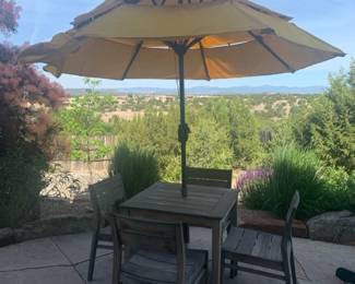 Patio table, umbrella and 4 chairs