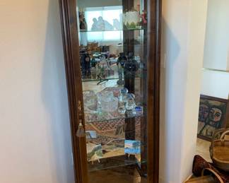 Display cabinet with glass shelves and interior light