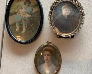 Antique miniature portraits and a hand colored photo