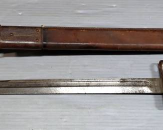 1906 Rock Island Arsenal Bayonet, Marked U.S. With Flaming Bomb, 15.75" Blade, Part Of Grip Missing, In Scabbard