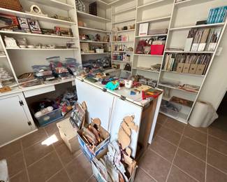 The craft room is staged with every crafting item under the sun. Sewing, quilting, knitting, crocheting, needlepoint, painting, ceramics, wood crafts and so much more !!!