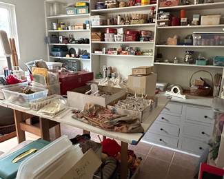 The craft room is filled with sewing, painting, quilting supplies galore.