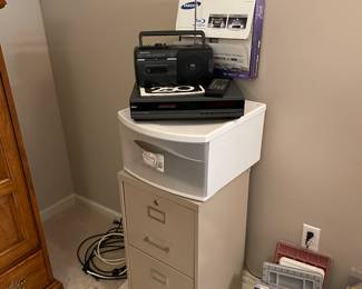 Two drawer file cabinet, radio, Blu Ray player, VHS
