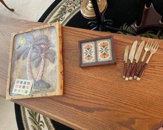 Mid 60s cars, wooden palm tree art, and set of wood handle silverware