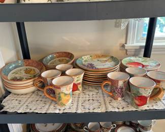 Susan Winget- plates, mugs, and wonderfully large bowls in this colorful set. 
