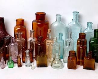 DILA209 AntiqueVintage Assortment Glass Bottles A mixture of Alixer, Chemical, Perfume, Pharmacy & Pill bottles, as well as others. Antique & vintage.