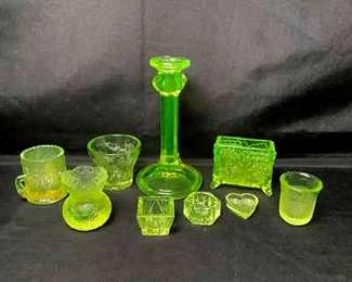 DILA212 Vibrant Glow, Uranium Glass Pieces Candlestick, Boyd Vaseline glass card holder, Westmoreland carnival glass toothpick holder, Mosser glass toothpick holder, shoot glasses, cups and salt dishes.