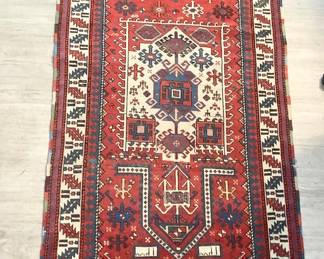 TOSH343 Hand knotted Persian Rug #1 Signed, in Farsi (possible prayer) Rug is approximately 35" wide x 5' long. There is some wear in the thread. Possibly from Iran or South Caucasus. Likely it is over 100 years old.