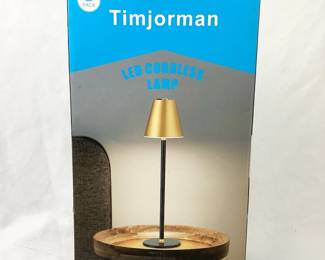 DILA347 Timjorman Khaki Table Lamps Still in original packaging these lamps are 13.97" tall and 3.46" wide. They are made of metal and operate on battery.