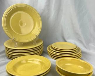 DILA319 Yellow Bowls Plates Fiesta Ware This is a partial set. 9 Dinner Plates, 4 Salad Plates, 2 Soup Bowls, 2 Cereal Bowls, 2 Bread Plates and 2 Saucers- different styles. One saucer is Fiesta ware the other Homer Laughlin China.