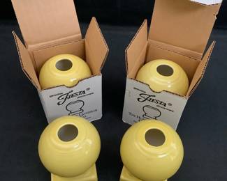 DILA216 Fiesta Round Candlestick Holders 4 Genuine Fiesta Dinnerware "Sun Flower" round candlestick holders. 2 new in box, 2 used.