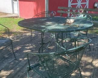 Green metal outdoor table with 4 chairs 