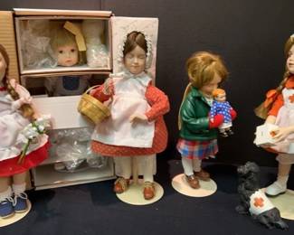 Five Porcelain Dolls Red Cross With Dog, Little Runaway In Box, And more