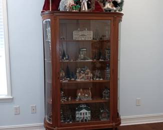 Antique oak curved glass china cabinet.
