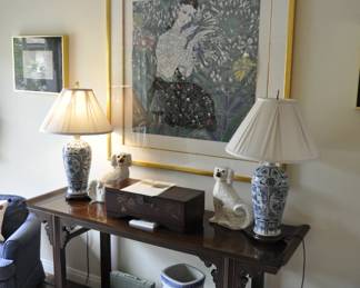 Chinese altar table with Jiang Tiefeng art above.