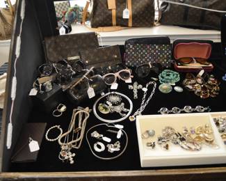 Sunglasses by Chanel, Gucci, etc.  Louis Vuitton clutches