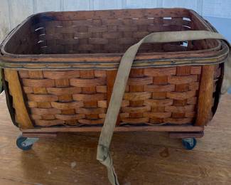 ANTIQUE BASKET ON CASTERS AND PULL STRAP