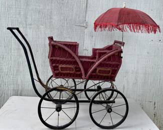 ANTIQUE BUGGY WITH FRINGED UMBRELLA