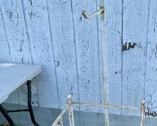 ANTIQUE WROUGHT IRON CLOTHING RACK DISPLAY (ONE BALL FOOT NEEDS TO BE WELDED ON THE RIGHT REAR)