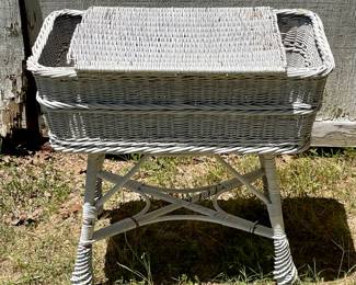 ANTIQUE WICKER STORAGE TABLE