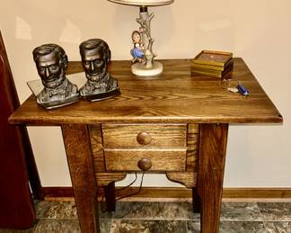 Oak side table, Lincoln bookends, Hummel Apple Tree lamp