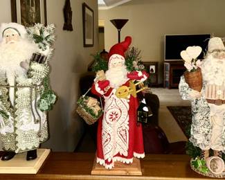 Three collectible Santas, one on left SOLD