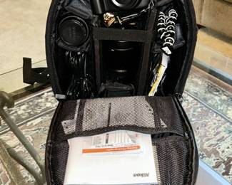Nikon D3000 camera and accessories in large case