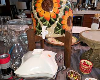 Sunflower water dispenser on wood stand