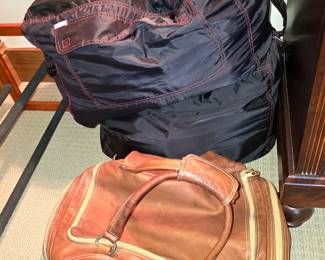 Sleeping bags. Leather Columbian Bags Co. leather duffle bag