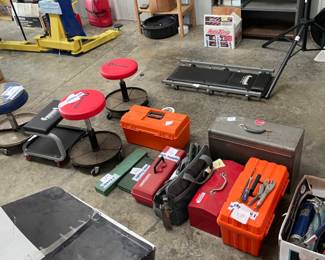 Small tools boxes with tools, shop stools
