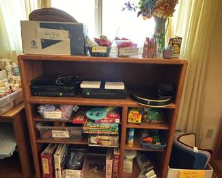 Entertainment center, games, craft books, electronics, hats, gloves, scarves, foam floor mats