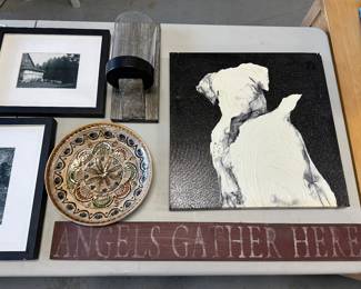 Decorative wall objects, like plates and candles 