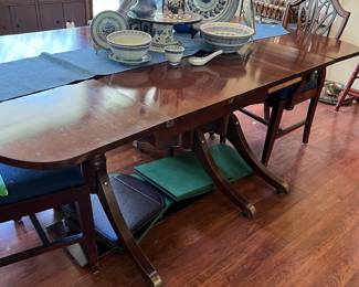 Duncan Phyfe table, chairs, and table covers, accessories