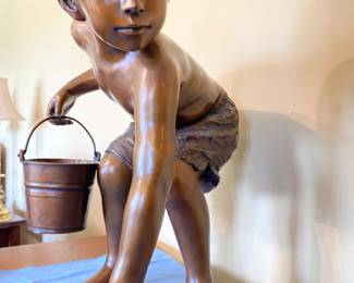 Full pic of the bronze boy with his bucket.