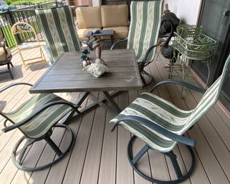 This patio table set has 2 additional chaise lounges that are not pictured.