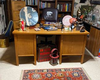 Large oak school teacher's desk...K-state office chair in background.