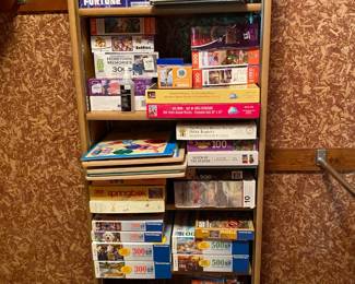 Shelves full of games and misc. children's items.