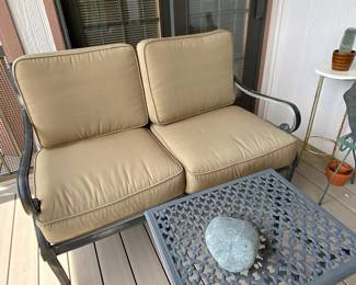 Two cushion outdoor settee.